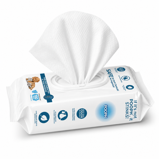 A package of white pet cleaning wipes with one wipe pulled out from the top, shown on a clean white background. The packaging features blue text and icons, including 'POOPH' and 'If it's not poop, it stinks!'.
